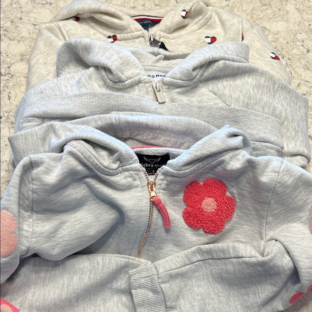 A bundle of size 5 hoodies. GUC